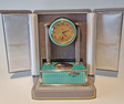 Vintage silver-gilt, guilloche turquoise enamel and pictorial enamel timepiece alarm-actuated singing bird box, by C. A. Marguerat