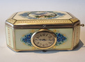 A very fine silver gilt and Imperial Yellow guilloche enamel singing bird box with timepiece, by C. A. Marguerat