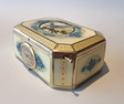 A very fine silver gilt and Imperial Yellow guilloche enamel singing bird box with timepiece, by C. A. Marguerat