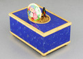 Lapis-lazuli enamelled and gilt musical timepiece alarm-actuated singing bird box, by Reuge