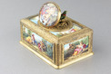 Tooled gilt bronze and enamel singing bird box