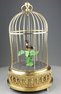 Small single singing bird-in-cage, by Karl Griesbaum