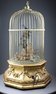 Antique Hexagonal-profile large single singing bird-in-cage, by Phallibois