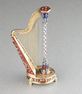 Gold, enamel and split seed pearl embellished musical harp with hidden scent bottle