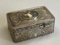 Engraved silver-gilt and painted ivorine pictorial study singing bird box,  Early-period Karl Griesbaum