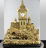 Antique gilt bronze castle fort timepiece, with rocking ship automaton