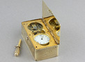 Antique silver-gilt skeleton-escapement timepiece snuffbox