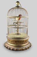 Large antique single singing bird-in-cage, by Phallibois