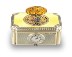 Silver gilt and enamel singing bird box with timepiece, by C. H. Marguerat