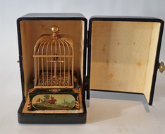 An exquisite Miniature Singing bird Cage in original leather case by E. Flajoulot