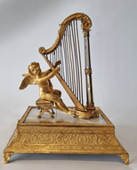 Musical Palais royal Ring stand and jewellery box, of Cupid with harp