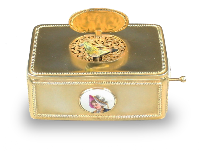 Silver-gilt and painted porcelain-bossed singing bird box, by B. F. of Germany