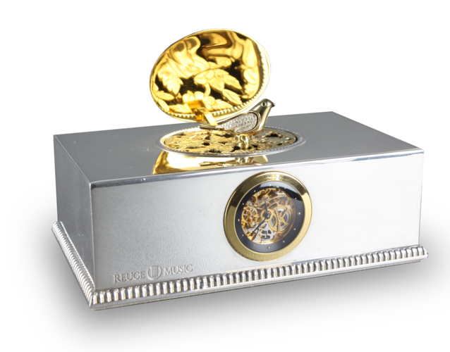 Contempary sterling silver, gold and diamond singing bird box with timepiece, by Reuge