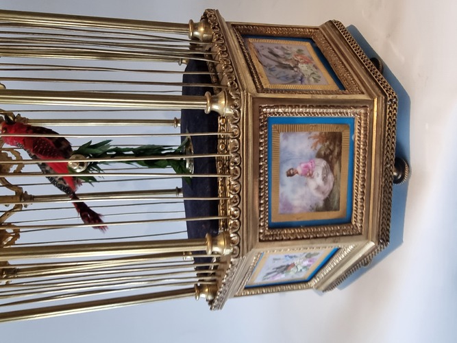 A stunning and very fine  Hexagonal  shaped, gilt bronze and Sevres plaque single singing bird-in-cage, by Bontems