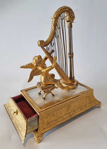 Musical Palais royal Ring stand and jewellery box, of Cupid with harp