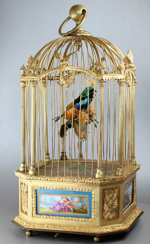 A stunning and very fine gilt bronze and Sevres plaque single singing bird-in-cage, by Bontems