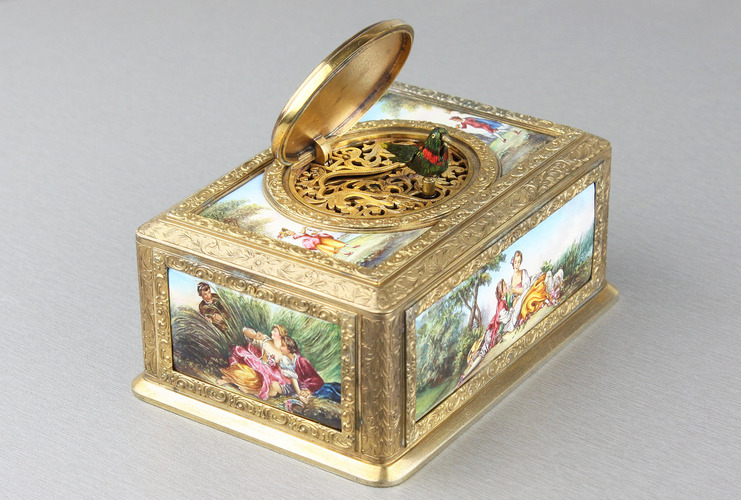 Tooled gilt bronze and enamel singing bird box