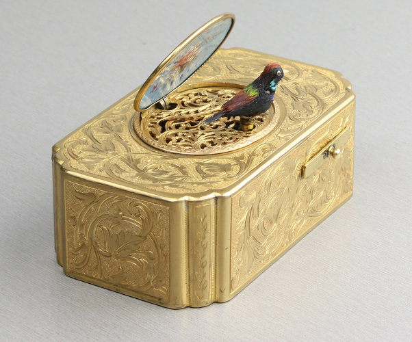 Antique gilt metal and pictorial enamel singing bird box, by John Manger