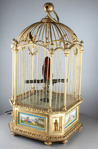 A stunning and very fine gilt bronze and Sevres plaque single singing bird-in-cage, by Bontems