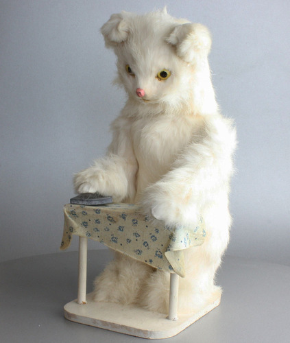 A vintage white cat ironing automaton, by Roullet & Decamps