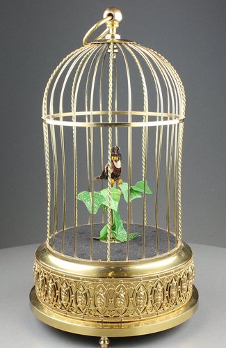 Small single singing bird-in-cage, by Karl Griesbaum