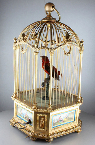 A stunning and very fine gilt bronze and Sevres plaque single singing bird-in-cage, by Bontems