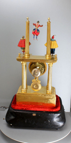 Antique gilt metal musical acrobat automaton timepiece, by Jean Robert Houdin