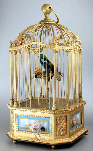 A stunning and very fine gilt bronze and Sevres plaque single singing bird-in-cage, by Bontems