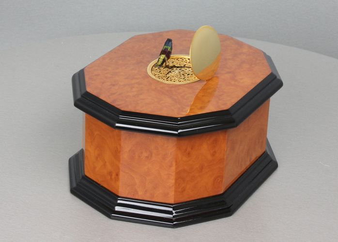 An exclusive and contempary decagonal singing bird card box, by Reuge