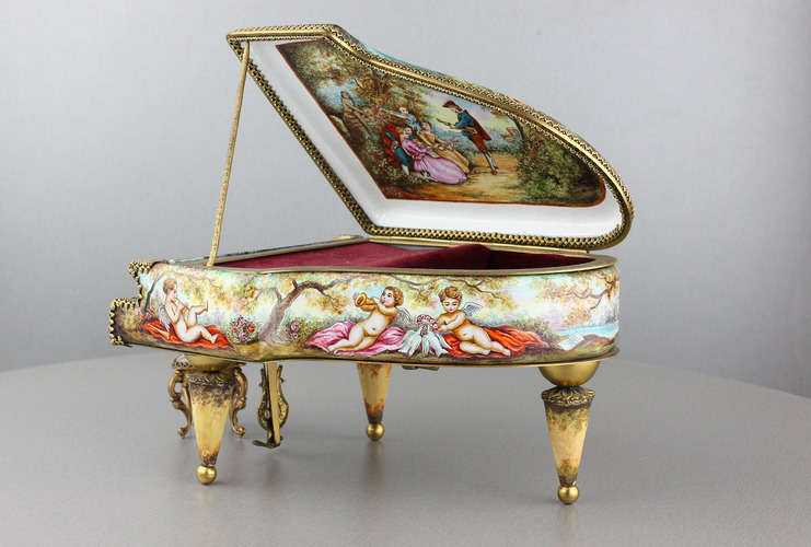 A large vintage Viennese enamel and gilt metal musical grand piano with chair