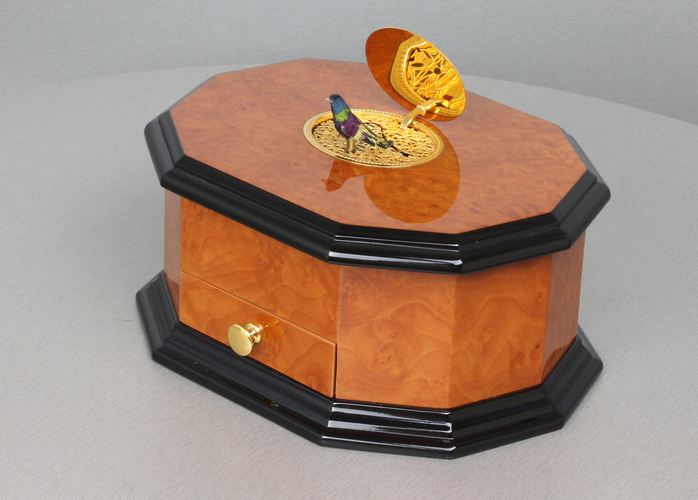 An exclusive and contempary decagonal singing bird card box, by Reuge