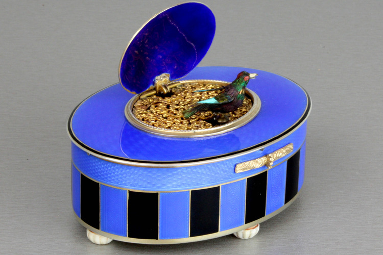 Silver-gilt and duet enamel oval singing bird box, by C. H. Marguerat