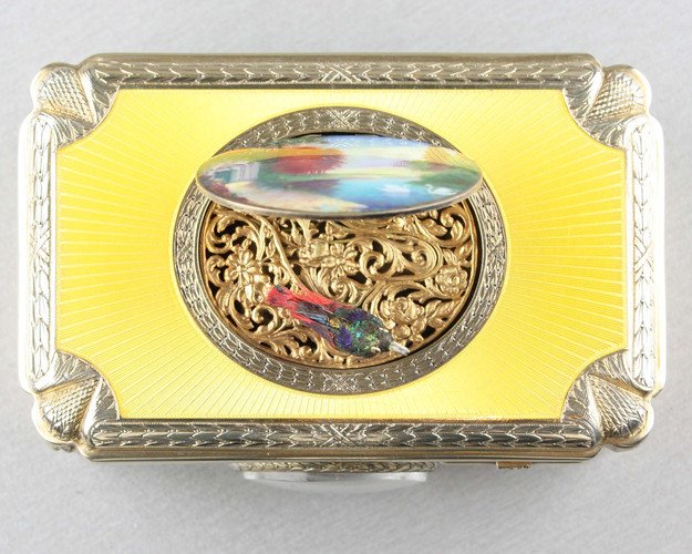 Silver gilt and enamel singing bird box with timepiece, by C. H. Marguerat