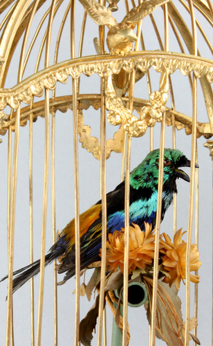 A stunning and very fine gilt bronze and Sevres plaque single singing bird-in-cage, by Bontems