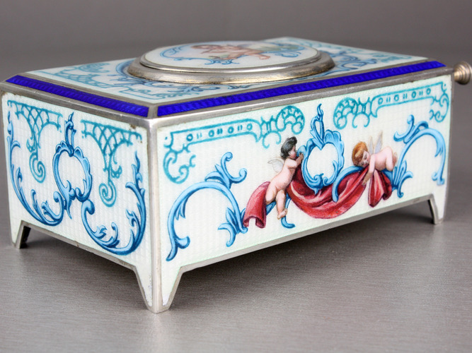 A superb silver and full guilloche painted enamel singing bird box, circa 1925