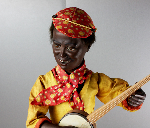 A very rare and fine antique black boy banjo player musical automaton, by Gustave Vichy