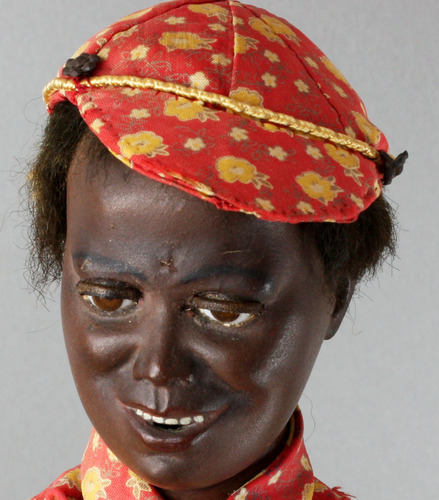 A very rare and fine antique black boy banjo player musical automaton, by Gustave Vichy