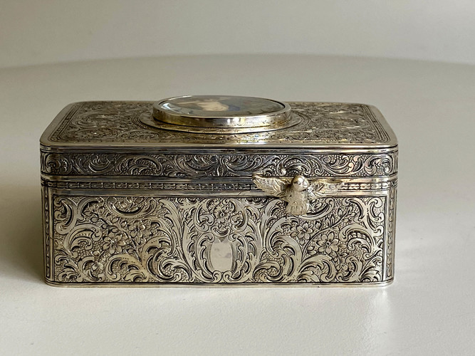 Engraved silver-gilt and painted ivorine pictorial study singing bird box,  Early-period Karl Griesbaum