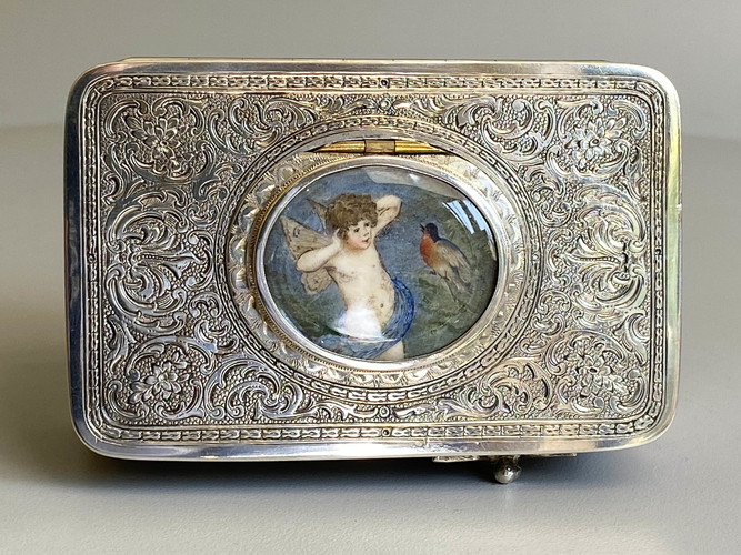 Engraved silver-gilt and painted ivorine pictorial study singing bird box,  Early-period Karl Griesbaum