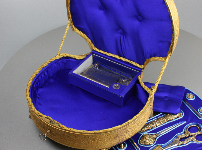 A highly desirable and fine antique gilt metal and silver-gilt Palais Royale musical necessaire