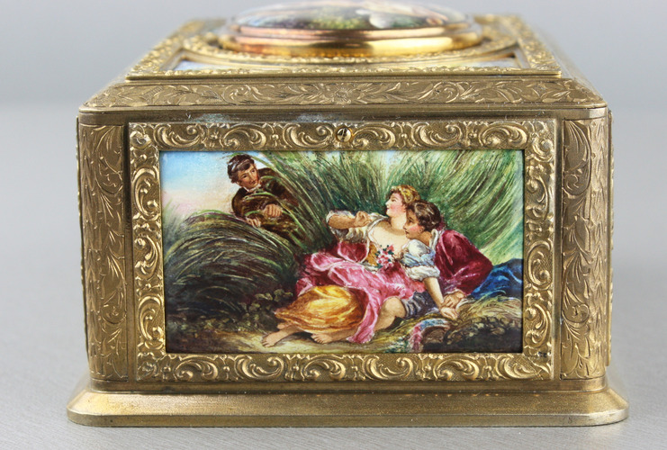 Tooled gilt bronze and enamel singing bird box