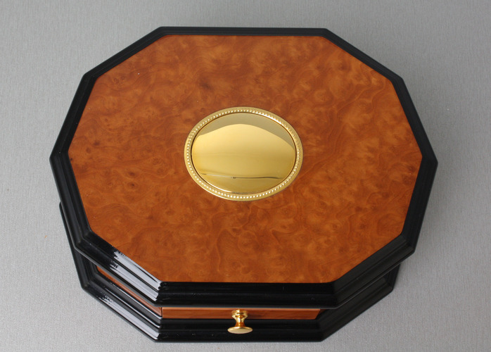 An exclusive and contempary decagonal singing bird card box, by Reuge